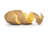 peeled potatoes with the skin on a white background