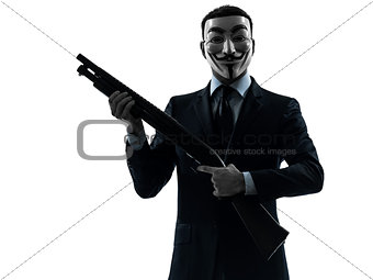 man masked anonymous group memeber holding shotgun silhouette po