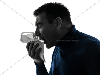 man sneezing silhouette portrait