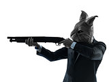 man with rabbit mask hunting with shotgun silhouette portrait