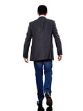 business man walking rear view silhouette