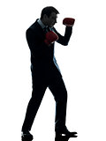 business man boxer with boxing gloves  silhouette