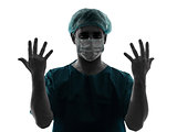 doctor surgeon man portrait with face mask showing hands silhoue