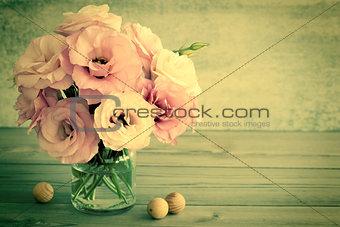 Gentle Flowers in a glass vase with copy space - retro toned