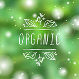 Organic - product label on blurred background.