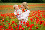 Mommy and daughter in a meadow