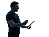 man cleaning dusting  digital tablet  silhouette