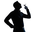 silhouette man portrait smoking cigarette