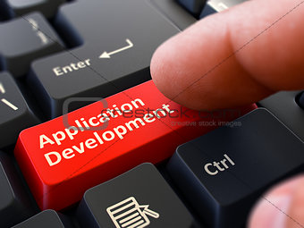 Finger Presses Red Keyboard Button Application Development.