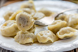 Dumplings with butter and black pepper.