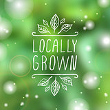 Locally grown - product label on  blurred background.