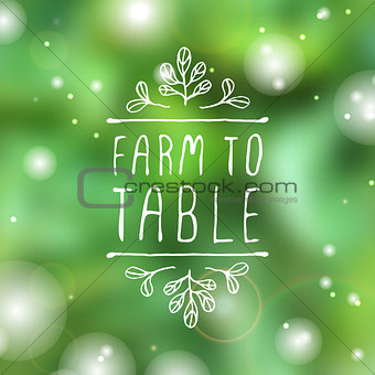 Farm to table - product label on blurred background.