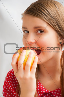 Teenage girl with apple
