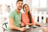 Young couple drinking coffee
