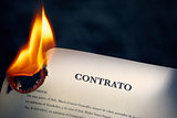 Closeup Of Contract In Spanish Burning On Fire