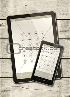 Smartphone and digital tablet PC on a white wood table