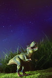 Tyrannosaurus on grass at night