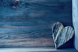 Wooden heart on shelf