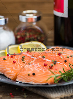 Raw Salmon Fish Fillet with Wine, Lemon, Spices and Fresh Herbs