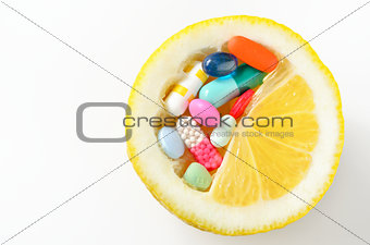 pills and lemon  isolated 