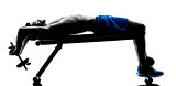 man exercising fitness weights Bench Press exercises silhouette