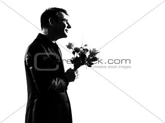 silhouette  man offering flowers