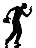 thief criminal holding gun silhouette