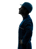 man construction worker looking up profile silhouette portrait