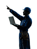 man construction worker computing computer silhouette portrait