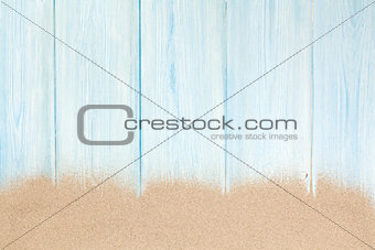 Sea sand on wooden floor