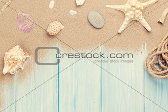 Sea sand with starfish and shells
