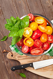 Fresh colorful tomatoes and basil