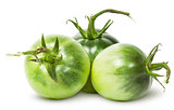 Three green tomatoes near