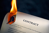 Closeup Of Contract In English Burning On Fire