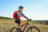 Cyclist Riding the Bike on the Beautiful Summer Mountain Trail. Sport Concept.