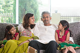 Happy Indian family at home