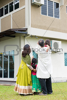 Rear view of Indian family