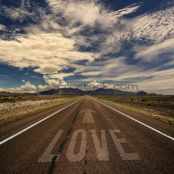 Conceptual Image of Road with the Word Love