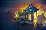 Christmas lantern with fir and tinsel