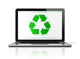 Laptop computer with a recycling symbol on screen. environmental