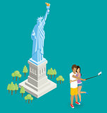 Couple Making Selfie Near The Statue of Liberty in USA