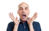 bald man with shocked facial expression