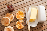 English Muffins, Butter and Jam on Wooden Table