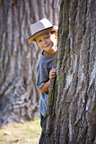 portrait of a little boy wearing hat
