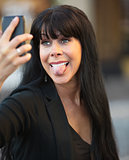 Woman Sticking Out Her Tongue