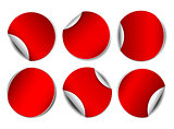 Set of red round promotional stickers.