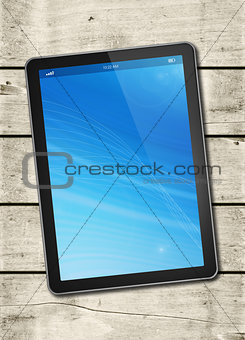 Digital tablet PC on a white wood table