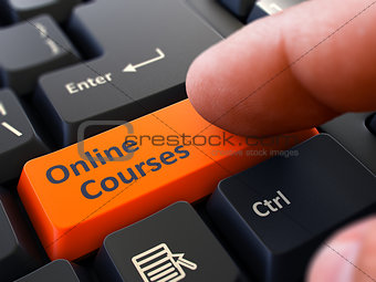 Online Courses - Concept on Orange Keyboard Button.