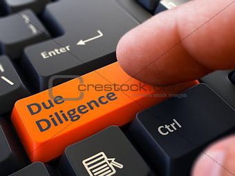 Due Diligence - Written on Orange Keyboard Key.