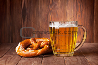 Lager beer glass and pretzel